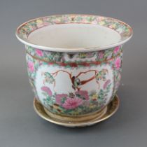 A hand enamelled Canton porcelain planter and tray, dia. 31cm, H. 26cm.
