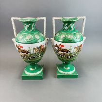 A pair of continental porcelain pierced vases decorated with hunting scenes , H. 37cm.
