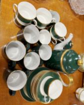 A Coalport Athlone-Green coffee set and similar mugs.