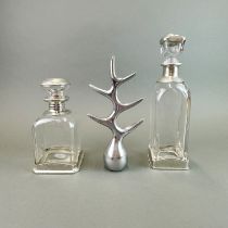 Two Itallian Brescia Peletro, Itallian Pewter and glass decanters, tallest H. 31cm, together with