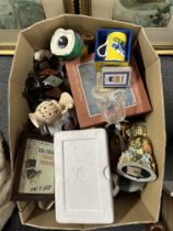 A box of mixed ceramic and other items.