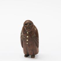 An 18th century carved walnut wood figural snuff box, H. 7cm. A/F to left foot, one eye missing.