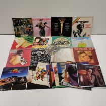 A group of mixed LP records.