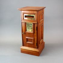 A wooden hotel letter box, H. 50cm.