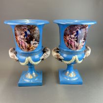 A pair of large continental porcelain urns, H.47cm.