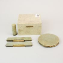 A 1930's shagreen covered cigarette box ( 11 x 10 x 6cm), powder compact, 2 combs and a lipstick