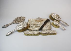 A 12 piece hallmarked silver dressing table set.