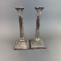 Pair of large hallmarked silver column candlesticks, H. 32cm.