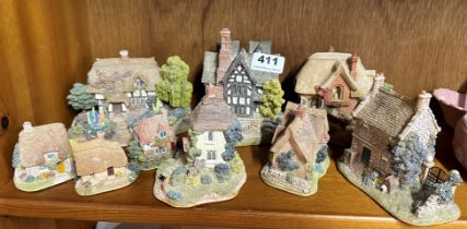 A group of nine Lilliput Lane cottages, largest H. 13cm.