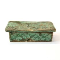 A Chinese glazed ceramic pillow sgraffito decorated with birds and lotus, 17.5 x 9.5 x 6cm.