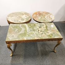 A heavy quality brass and onyx coffee table and a matching circular onyx occasional table together