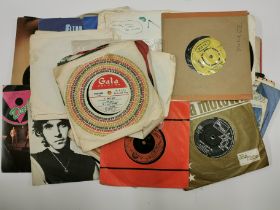 A group of 7 inch singles.