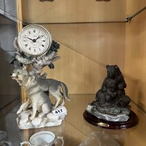 A vintage resin animal clock and bear figure, H. 27cm.