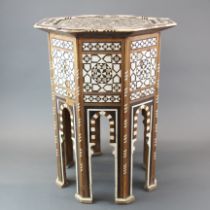 A 19thC Indian mother of pearl and bone decorated table, W. 44 H. 58cm.