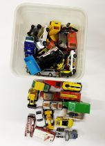 A box of mixed used diecast matchbox models.