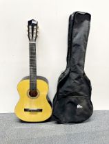 A cased Elevation acoustic guitar.