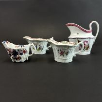 A group of four 18thC english soft paste porcelain jugs. H. 11cm (some a/f)