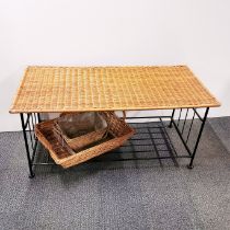 A wicker and metal coffee table together with further wicker baskets/trays, table 100 x 50 x 45cm.