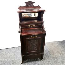 A single drawer carved mahogany perdonium on castors, 99 x 43 x 34cm.