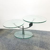 A contemporary tempered glass and steel table. 120 x 56cm.