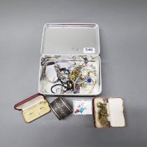 A box of mixed jewellery and other items.