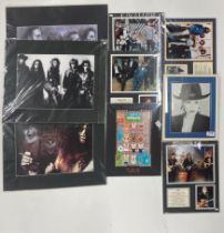 A quantity of framed pop and rock photographs, one autographed.