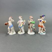 A group of 4 Naples porcelain cherub figures, H. 6cm.