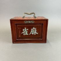 A mid 20thC cased Chinese Mahjong set 23.5 16 x 16cm.