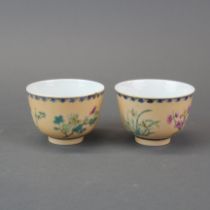 A pair of Chinese hand painted porcelain tea bowls. Dia 8.5cm. D. 6cm.
