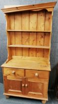 A pine two drawer kitchen dresser, overall H. 190cm W. 95cm D. 48cm.