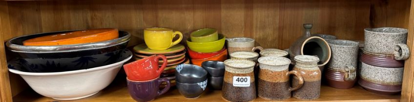 A quantity of kitchen pottery items.