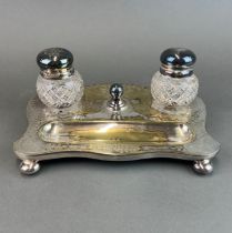 An Edwardian silver plated and cut glass desk stand, W. 26cm, D. 19cm.