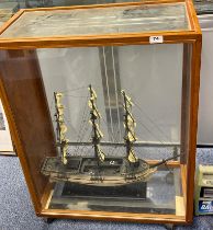A cased handmade model of a 17th C, 3 masted ship. Case size 69 x 36 x 87cm.