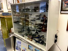 A useful glass fronted display cabinet. Sized 122cm x 91 x 46cm