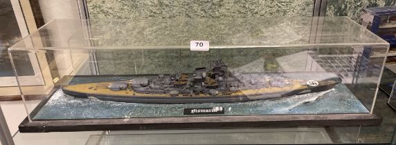 A cased plastic kit model of battleship Bismarck, case L. 82cm, Together with a framed print of