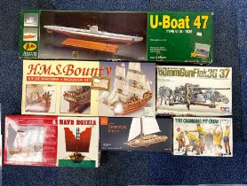 A group of 6 un-made commercial model kits.