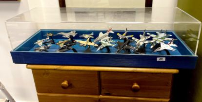 A perspex cased group of 15 diecast models of aircraft. Size of case is 92cm x 32cm x 24cm