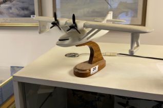 A handmade wooden model of a Catalina sea plane. Wingspan. 43cm H.20cm