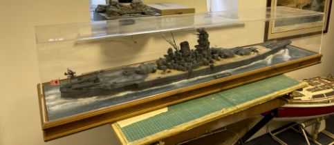 A large cased plastic kit model of the Japanese battleship Yamato, Case size 145 x 33 x 32cm.