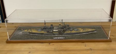 A cased plastic kit model of the battle ship King George V. Case L. 82cm.
