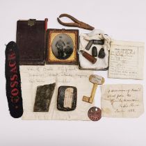 A collection of mixed items including sketchbook photographs, etc, collected by a soldier in North