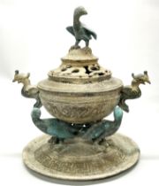 An archaic form Chinese bronze censer mounted with birds, Dia. 32cm, H. 41cm.