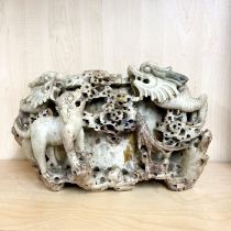 A large 19th C Chinese soapstone brush pot (repaired) 37 x 20cm.