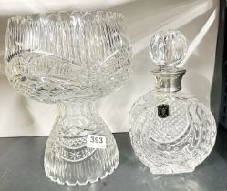 A cut crystal bowl and stand with a hallmarked silver mounted crystal decanter, bowl slightly A/F.