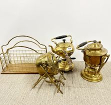 Three brass spirit kettles and stands with a brass magazine rack.