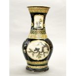 A Chinese Famille noir decorated stoneware vase, drilled as a lamp base, H. 42cm.