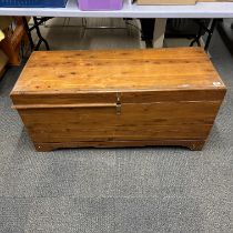 A large pine trunk, 120 x 46 x 56cm and a further pine box.