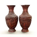 A rare pair of Chinese Ming Dynasty cinnabar lacquer vases, H. 26cm.