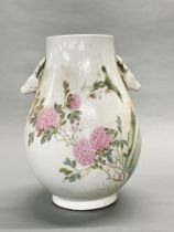 A large Chinese hand painted porcelain vase with stag head handles, probably Republican period or