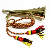A brass bugle, L. 28cm.